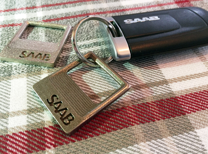 SAAB - Key Ring Pendant Bottle Opener 3d printed Polished Nickel Steel (left) vs Stainless Steel