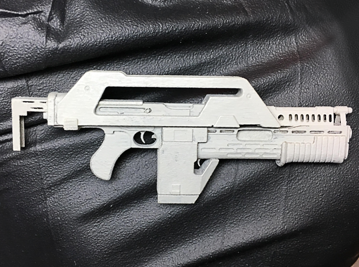 1/10 scale Pulse Rifle for 7” action figures 3d printed Rifle printed in Frosted Extreme Detail and primed for painting.