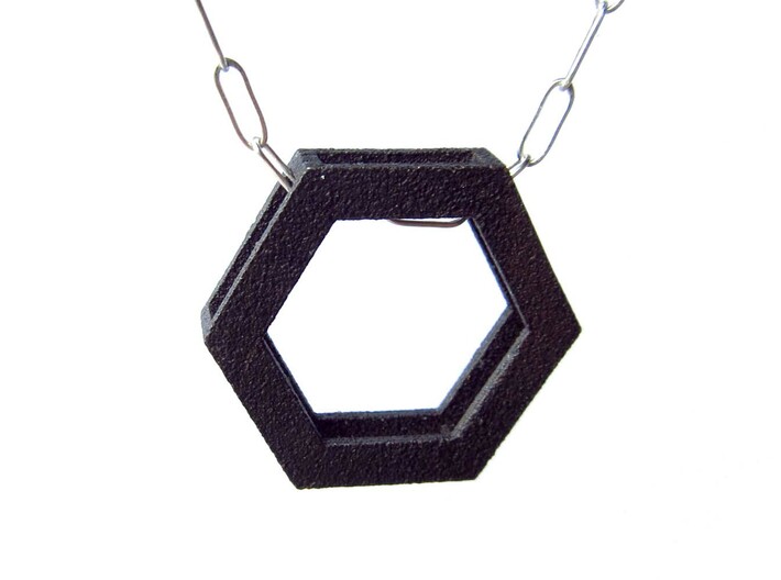 Simple Hexagon Pendant 3d printed The chain is slightly hidden by the hexagon frame.