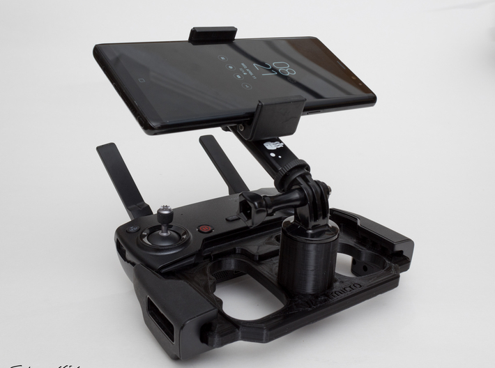 DJI Controller Phone / Tablet Mount Plate Insert 3d printed Inserted into the DJI Mavic Air controller with a Samsung Note 8 attached using a standard cell phone holder with GoPro mount.