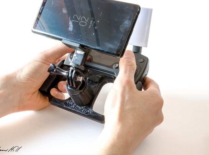 DJI Controller Phone / Tablet Mount Plate Insert 3d printed Inserted into Mavic Pro controller with GoPro tripod mount and Samsung Note 8 attached.