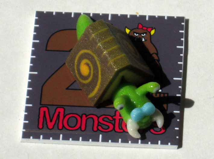 2 Inch Monsters: Batch 01 3d printed Book Snail on his stand.