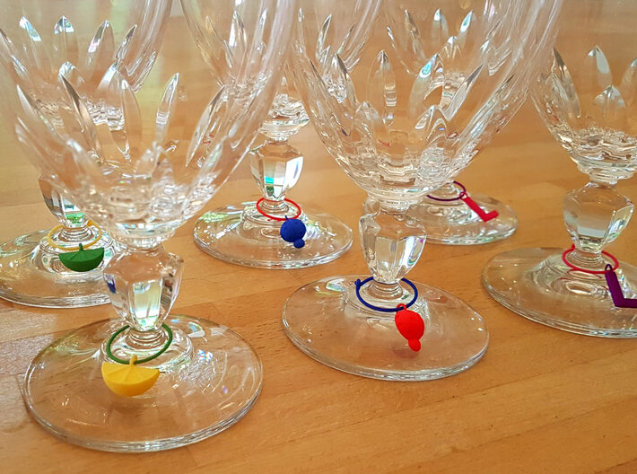 Citrus Wine Charm 3d printed Different wine charms shown on glasses