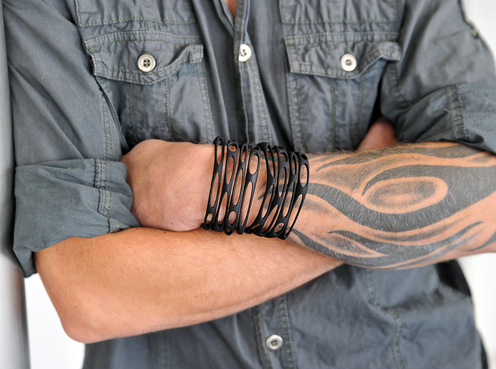 Rocker Coil Bracelet Perforated  3d printed Male wearing two bracelets