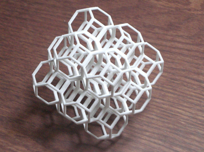 Truncated Octahedra 3d printed 14 packed cubeoctahedra filling space. Photo is of white strong &amp; flexible plastic.