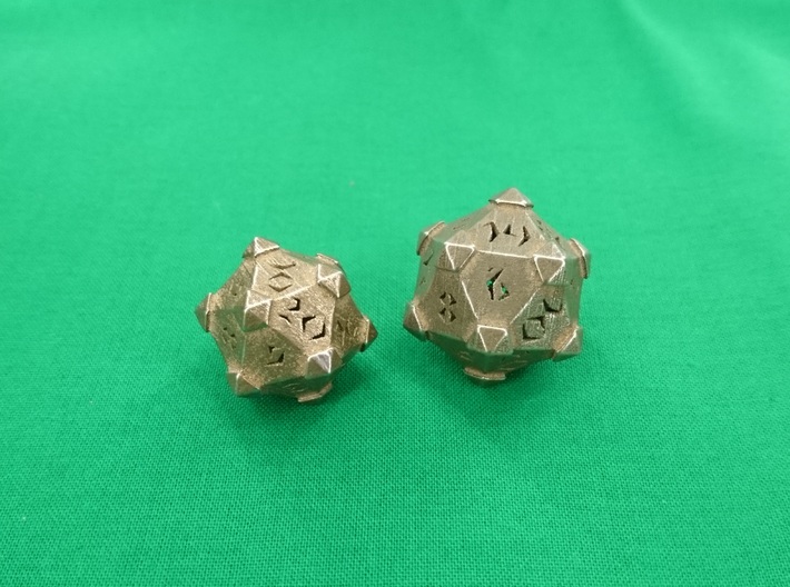 Prism D20 Closed 3d printed Prism D20 closed in polished bronze silver steel, medium left and large right.