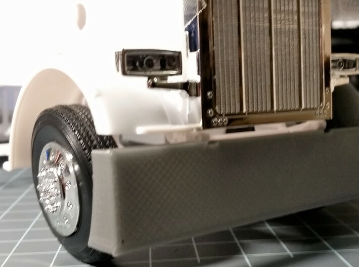Revell Swept Front Bumper  3d printed   Printed on my printer for test fitting. Bumper with kit fender on the left and my Revell Swept fender on the right.The bumper with the kit fender