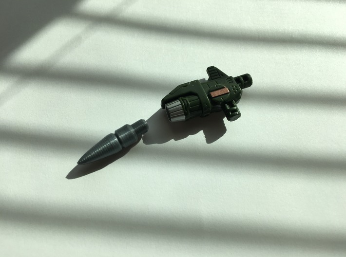 Siege War for Cybertron Hound Missile for Launcher 3d printed Home-printed missile next to stock launcher.
