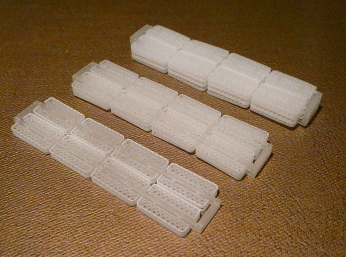 HO Pullman Parlor Car Luggage Racks Set 3d printed This image shows the small, medium, and large sprues side by side.  Each sprue size is sold individually via the "size" menu.