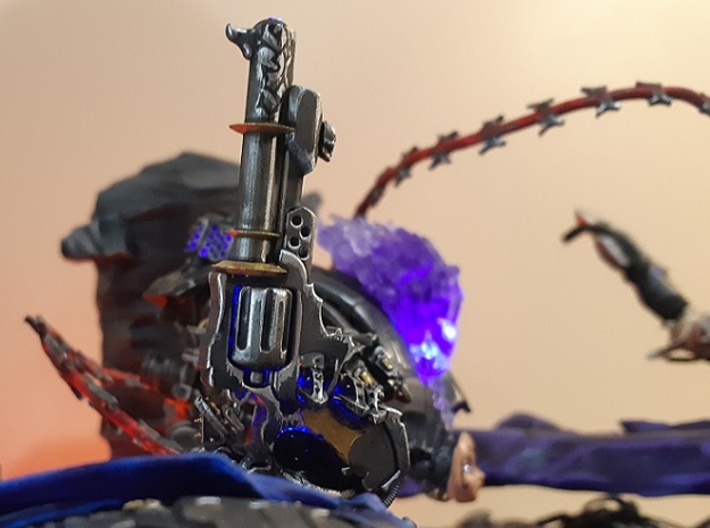 Redemption - Imperial Knight Scale 3d printed Redemption, painted and being held in the palm of a Thunderstrike Gauntlet