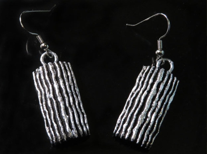 Groovy Bend earrings 3d printed Black PA12 with silver leaf, similar look to Antique Silver (render orientation error, so this image instead)