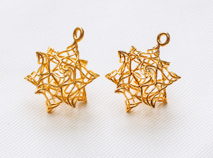 Stellated Dodecahedron Bauble 3d printed Polished Gold Steel (left) vs 18k Gold Plated Brass (right)