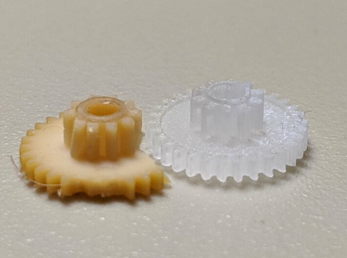 Replacement Floppy Drive Gear for Macintosh 3d printed The yellowed and broken original compared to this replacement part.