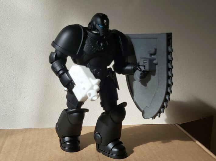Action Figure Chainshield - Right handed 3d printed Left handed version, printed in Grey PA12, held by a 1:12 scale action figure, along with  an Action Figure Bolt Pistol