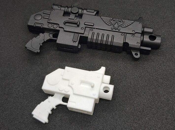Action Figure Bolt Pistol 3d printed Printed in White Processed Versatile Plastic, shown with the bolt weapon from a 1:12th scale action figure