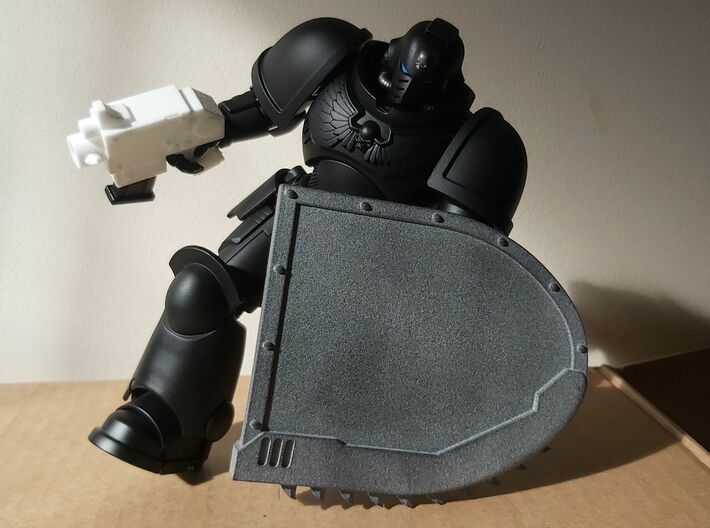 Action Figure Bolt Pistol 3d printed Printed in White Processed Versatile Plastic, shown with a Action Figure Chainshield and a 1:12 scale action figure