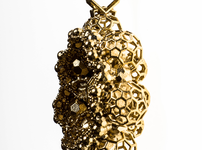Infinity Nugget - 2014 version 3d printed photo of pendant side view - raw brass
