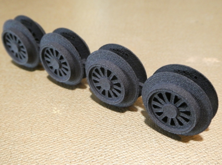 Brick RC Train Wheel Set, Spoked 3d printed The wheels arrive on a long sprue.  Sprues are available with either 8 (order "small" size) or 16 (order "large" size) wheels.