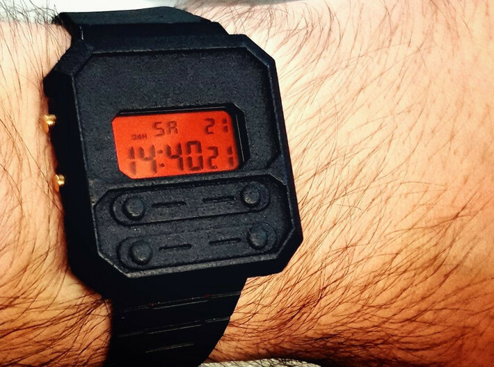 F-100 Watch Face Shroud for F-91W 3d printed Casio F-100 Watch Face installed on Casio F-91W red screen mod (not included) Photo from Shapeways user turboway2015