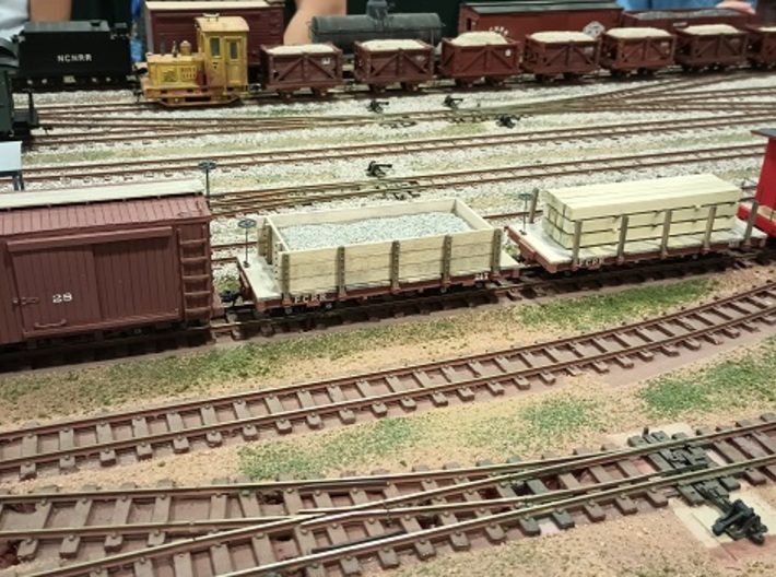 20 Foot On30 Freight Car Frame 3d printed Frame built up as a flatcar and as a gondola.  Pictured with a Bolder Valley Models 20ft boxcar and a Fever Creek bobber caboose.