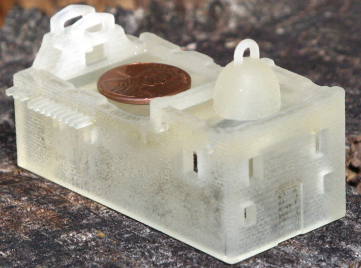Z Scale Adobe Mission 3d printed FUD print from the back with a penny for scale.