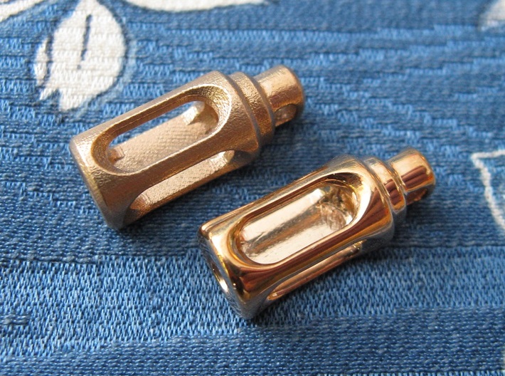 Tritium Earrings 2  (3x11mm Vials) 3d printed This photo shows both the polished and raw bronze finishes, as a comparison. It is only possible to order the earrings in one finish.