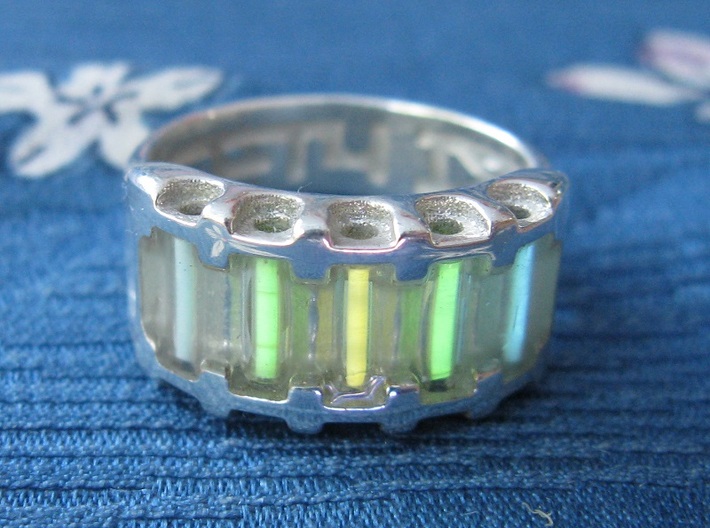 US11.5 Ring IX: Tritium 3d printed In this picture the phosphorus coating on the tritium vial being energised by UV light.