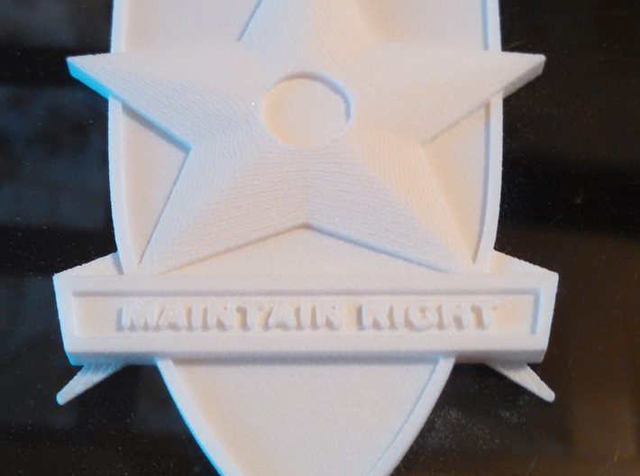 Main Force Patrol Badge (from the first Mad Max) 3d printed Print lines are visible on star and wings. This photo and the material tend to hide them.