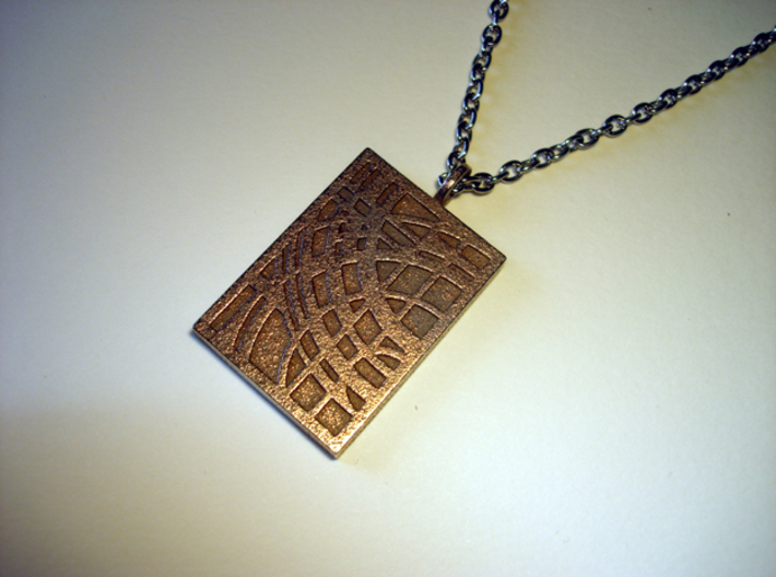 World Pendant 3d printed Stainless Steel - Photo of an actual printed item (chain not included)