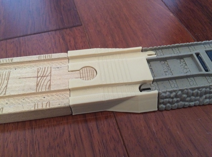Female Wooden Railway to Trackmaster Adapter 3d printed Test print done on consumer 3d printer. Part ordered from Shapeways will be exactly the same size but professionally printed at higher quality.