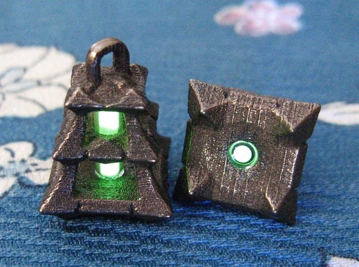 Thresh Tritium Lantern (All Materials) 3d printed In this picture the phosphorus coating on the tritium vial is being energised by UV light.