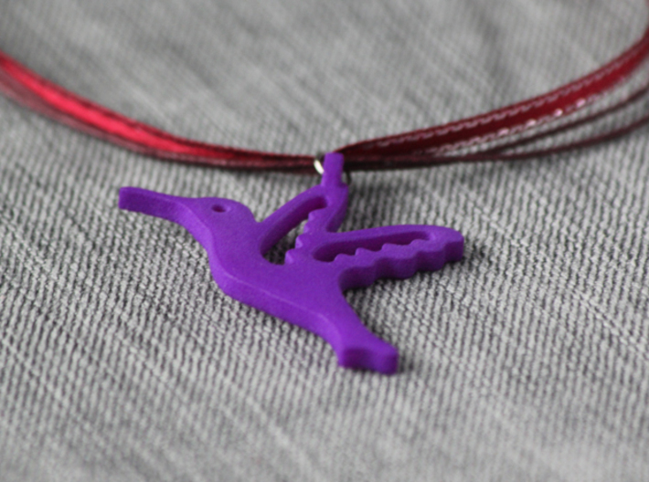 Hummingbird Pendant 3d printed Purple strong and flexible. Ribbon chain not included.