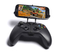 Controller mount for Xbox One & Apple iPhone 6s Pl 3d printed Front View - A Samsung Galaxy S3 and a black Xbox One controller
