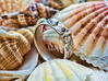 Sea Shell Ring 1 - US-Size 9 1/2 (19.41 mm) 3d printed Seashell Ring in polished silver (shown: size 10)