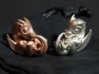 Dragon Baby Talisman 3d printed Raw Bronze and Polished Silver Materials