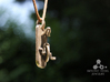 Unicycle Pendant 3d printed Stainless Steel Finish