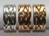 WOW5 Puzzle Ring 3d printed Interlocking Silver, Bronze, and Brass in the solved state.