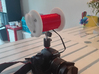 Binaural Mic Mount 3d printed the final product. The red center is the mic mount. 