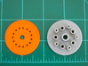 LED Mounting Disc - 1:350 Alternative Part 3d printed Printed part (left - orange) compared with original kit part (right).
