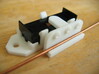 Railroad switch/point actuator PECO PL-13 (x9) 3d printed This shows the point rod attached to the actuator (glued).