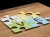 Puzzle Piece L - "Love-letters" 3d printed 4 puzzle pieces combined to write the word "love".