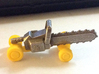 Chainsaw Car, Prize Size, Part A (Chassis) 3d printed Both parts of the kits combined, yellow S&F undercarriage, stainless steel chassis.