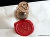 Linked Hearts Wax Seal 3d printed This is the seal and its impression in Red sealing wax.