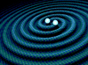 Two Black Holes Teardrop Pendant 3d printed Rendering of gravitational waves from 2 merging black holes