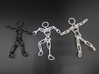 Ragdoll Pendant (5 parts) 3d printed Black Hi-Def Acrylate and Transparent Acrylic, surrounding their 11-part sibling.