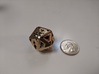 Future-Proof Hollow D20 3d printed Quarter for scale