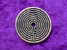 Labyrinth coin 3d printed Labyrinth side in polished grey steel.