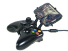 Controller mount for Xbox 360 & Alcatel Pop D5 3d printed Side View - A Samsung Galaxy S3 and a black Xbox 360 controller