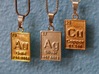 Copper Periodic Table Pendant 3d printed With It's Friends, Silver and Gold.  Polished Bronze & Silver, And Gold Plated Brass