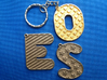 Patterned Letter Steel Keychain 3d printed Samples - O in polished gold steel, E and S in stainless steel